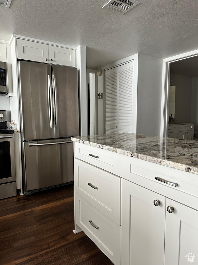 241 N Vine St E Unit 207W, Salt Lake City, UT 84103 - bathroom with wood finished floors and a textured ceiling
