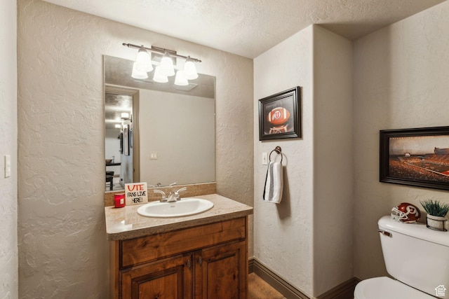 1744 E Burning Oak Dr, Draper, UT 84020 - half bath featuring a textured wall, vanity, toilet, and a textured ceiling