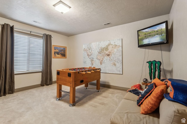 1744 E Burning Oak Dr, Draper, UT 84020 - playroom featuring light carpet, a textured ceiling, and baseboards