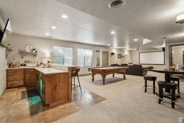 1744 E Burning Oak Dr, Draper, UT 84020 - recreation room with light colored carpet, a textured ceiling, recessed lighting, bar with sink, and billiards table