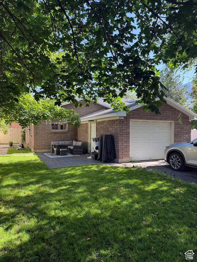 358 E 100 N, Provo, UT 84606 - view of side of property featuring a lawn, outdoor lounge area, and a garage