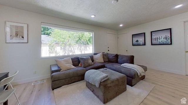358 E 100 N, Provo, UT 84606 - living room featuring a textured ceiling, light wood finished floors, baseboards, and recessed lighting