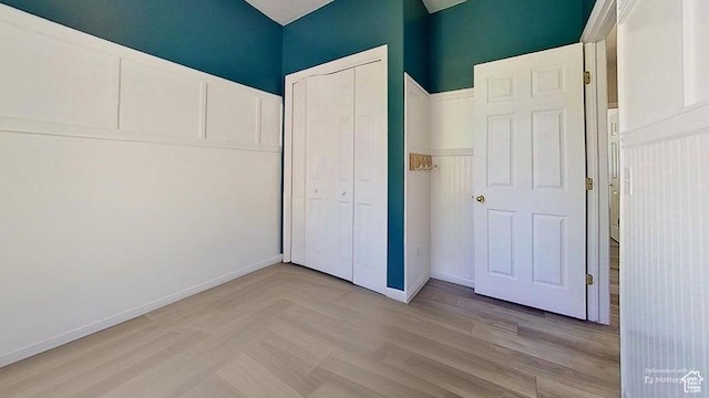 358 E 100 N, Provo, UT 84606 - unfurnished bedroom with baseboards, a closet, and parquet flooring