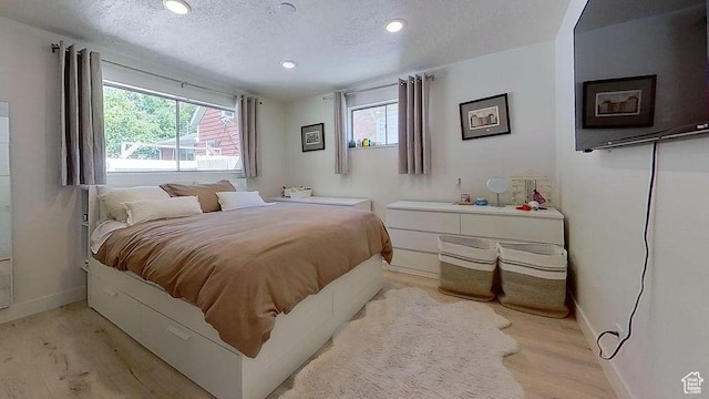 358 E 100 N, Provo, UT 84606 - bedroom with baseboards, light wood-style flooring, a textured ceiling, and recessed lighting