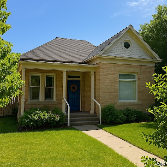 358 E 100 N, Provo, UT 84606 - view of front of home featuring a front yard and brick siding