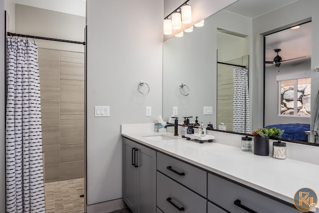 1060 W Jonathon Dr, Washington, UT 84780 - bathroom with ceiling fan, a stall shower, and vanity