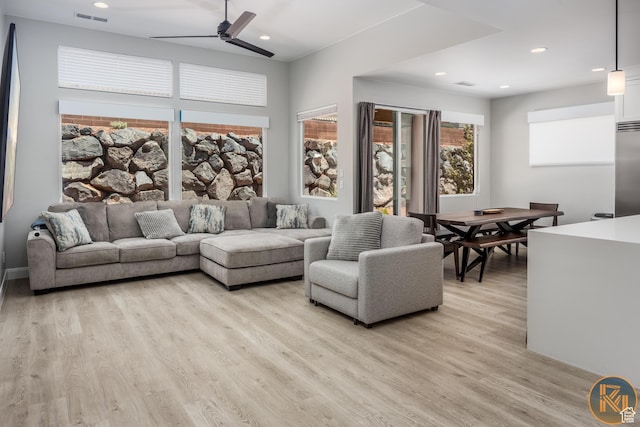 1060 W Jonathon Dr, Washington, UT 84780 - living room with light wood-type flooring, ceiling fan, and recessed lighting