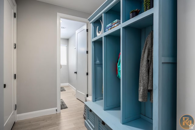 1060 W Jonathon Dr, Washington, UT 84780 - mudroom featuring light wood-style flooring and baseboards