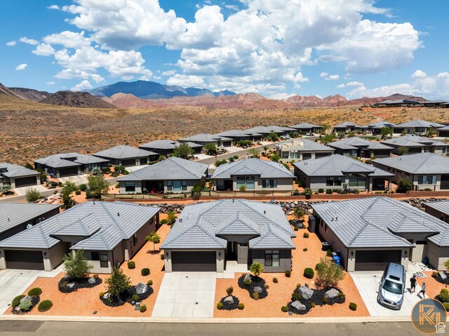 1060 W Jonathon Dr, Washington, UT 84780 - aerial view of residential area featuring a mountainous background