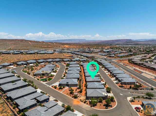 1060 W Jonathon Dr, Washington, UT 84780 - aerial view of residential area with a mountainous background