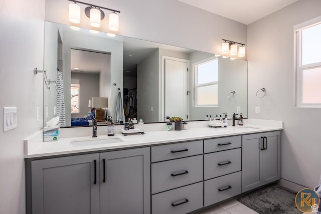 1060 W Jonathon Dr, Washington, UT 84780 - full bathroom featuring double vanity and tile patterned flooring