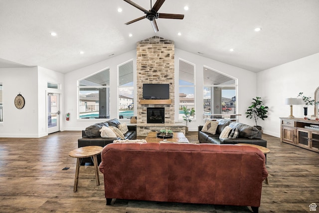 200 W 1200 S Unit 52, Tremonton, UT 84337 - living room with ceiling fan, dark wood-style floors, baseboards, vaulted ceiling, and healthy amount of natural light