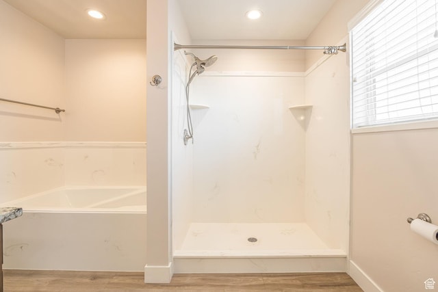 200 W 1200 S Unit 52, Tremonton, UT 84337 - full bathroom featuring a garden tub, wood finished floors, a shower, and recessed lighting