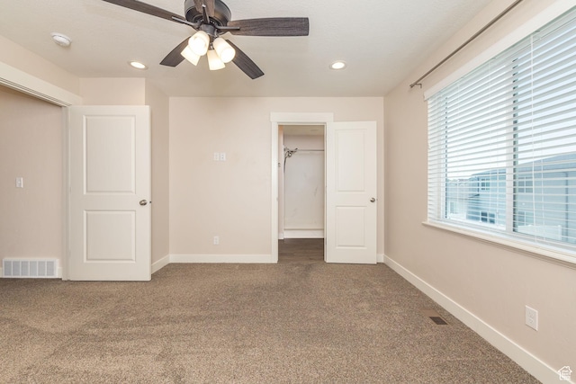 200 W 1200 S Unit 52, Tremonton, UT 84337 - unfurnished bedroom with carpet flooring, recessed lighting, a spacious closet, baseboards, and ceiling fan