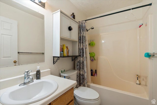 7638 S Redwood Rd Unit 17, West Jordan, UT 84084 - bathroom featuring toilet, shower / tub combo with curtain, and vanity