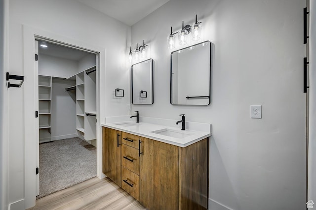 1605 S 1100 W, Payson, UT 84651 - bathroom featuring double vanity, wood finished floors, and a spacious closet