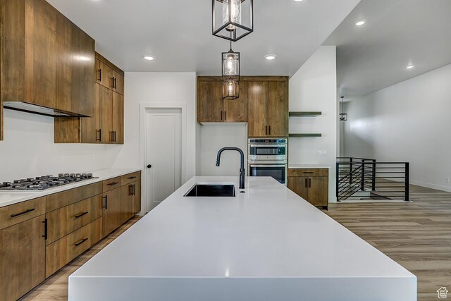 1605 S 1100 W, Payson, UT 84651 - kitchen featuring appliances with stainless steel finishes, open shelves, light wood-style floors, light countertops, and recessed lighting