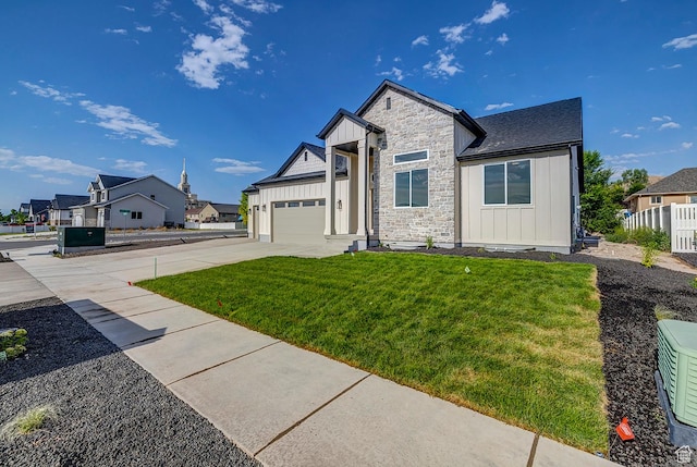 1605 S 1100 W, Payson, UT 84651 - view of front facade with board and batten siding, stone siding, a garage, and concrete driveway