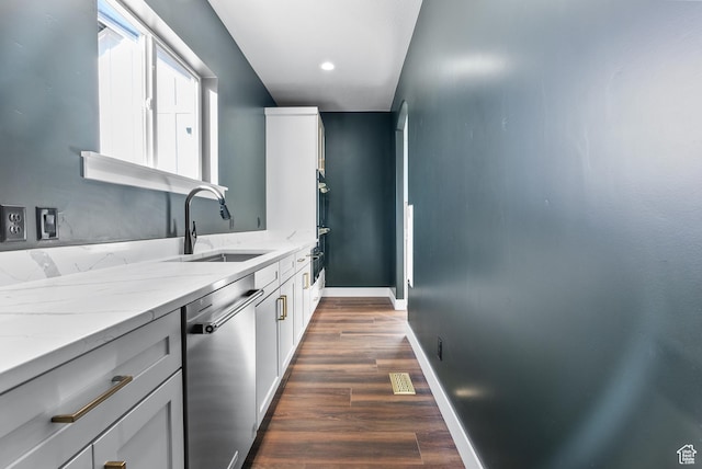 275 S 2800 E Unit 201, Spanish Fork, UT 84660 - kitchen with stainless steel appliances, a sink, light stone counters, dark wood-style flooring, and baseboards