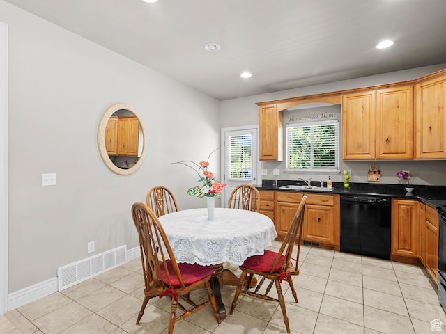 7764 S Rustic Pine Cv, Midvale, UT 84047 - kitchen with black dishwasher, dark countertops, light tile patterned flooring, a sink, and recessed lighting