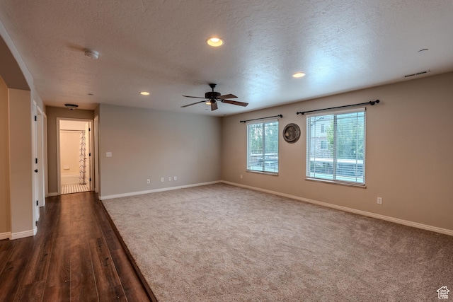 943 W 580 S Unit 97, Pleasant Grove, UT 84062 - unfurnished room featuring a textured ceiling, a ceiling fan, baseboards, a smoke detector, and dark wood-style floors