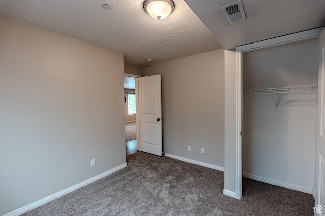 943 W 580 S Unit 97, Pleasant Grove, UT 84062 - unfurnished bedroom with carpet, a closet, baseboards, and a textured ceiling