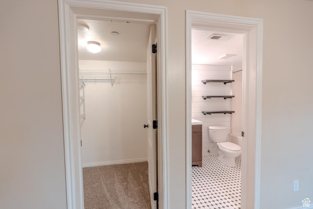 943 W 580 S Unit 97, Pleasant Grove, UT 84062 - full bathroom featuring toilet, vanity, a spacious closet, and shower / washtub combination