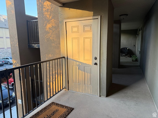 943 W 580 S Unit 97, Pleasant Grove, UT 84062 - doorway to property with stucco siding and a balcony