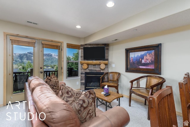 3521 N Moose Hollow Dr Unit 1202, Eden, UT 84310 - carpeted living area with french doors, baseboards, a fireplace, and recessed lighting