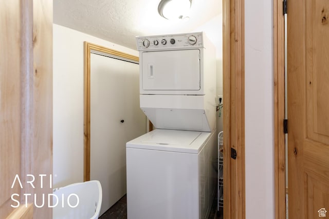 3521 N Moose Hollow Dr Unit 1202, Eden, UT 84310 - washroom featuring stacked washing machine and dryer