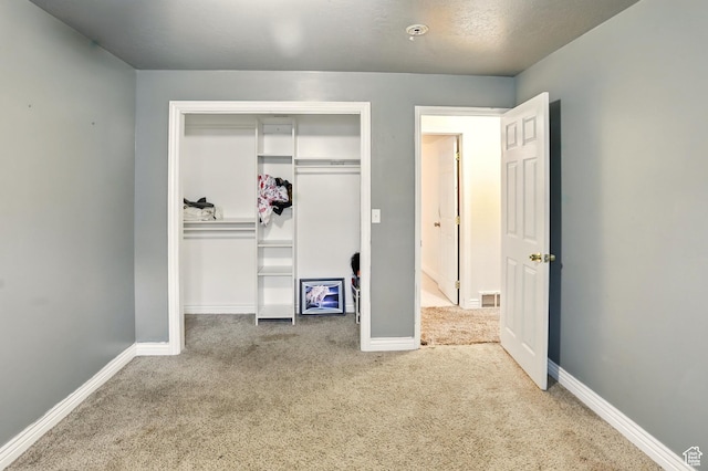 2865 W 3600 N, Farr West, UT 84404 - unfurnished bedroom featuring carpet, a closet, and baseboards