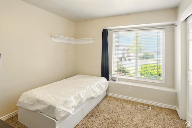 2865 W 3600 N, Farr West, UT 84404 - carpeted bedroom featuring multiple windows and baseboards