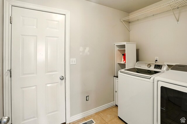 2865 W 3600 N, Farr West, UT 84404 - washroom featuring washer and dryer, light tile patterned floors, and baseboards