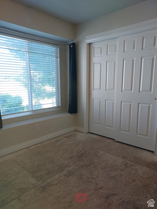2865 W 3600 N, Farr West, UT 84404 - unfurnished bedroom with a closet and baseboards