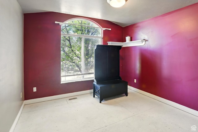 2865 W 3600 N, Farr West, UT 84404 - unfurnished room with baseboards, healthy amount of natural light, and concrete flooring
