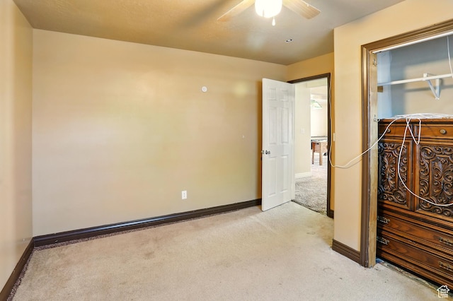 2865 W 3600 N, Farr West, UT 84404 - unfurnished bedroom featuring light carpet, baseboards, and ceiling fan