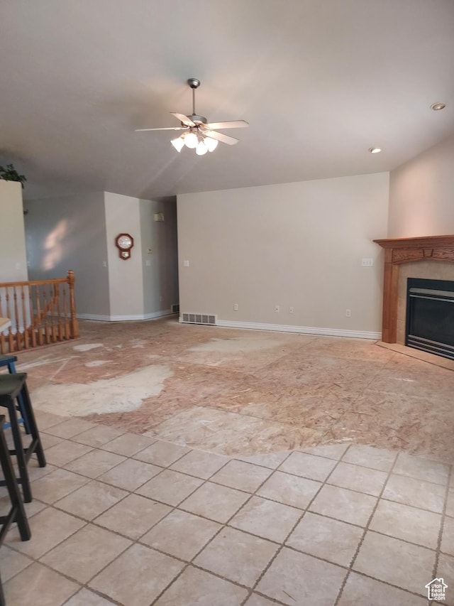 2865 W 3600 N, Farr West, UT 84404 - unfurnished living room with a ceiling fan, vaulted ceiling, a fireplace, and recessed lighting