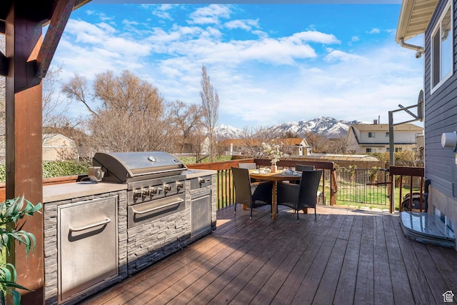 1962 W 12110 S, Riverton, UT 84065 - wooden deck with a mountain view and outdoor dining space