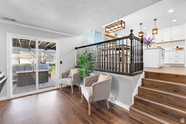 1962 W 12110 S, Riverton, UT 84065 - stairs featuring ornamental molding, wood finished floors, a chandelier, recessed lighting, and baseboards