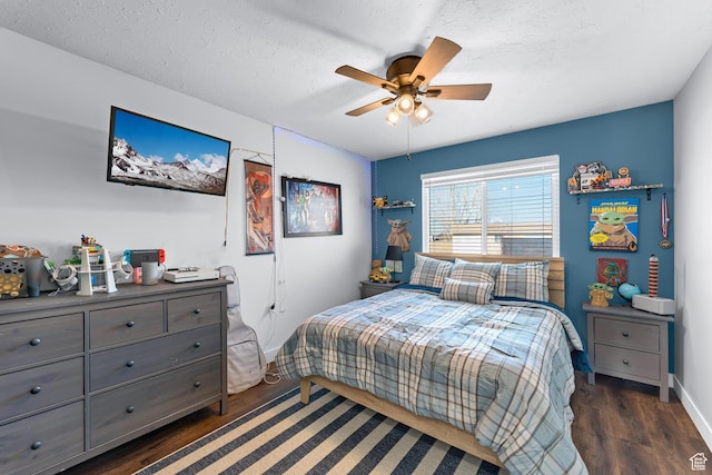 1962 W 12110 S, Riverton, UT 84065 - bedroom featuring dark wood-style flooring, a textured ceiling, ceiling fan, and baseboards