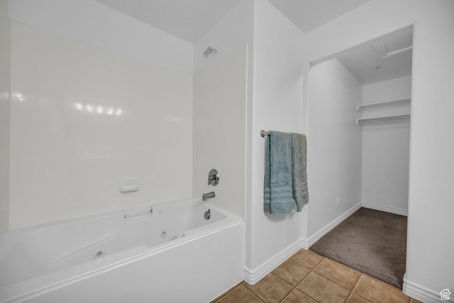 685 S 2220 W Unit 302, Pleasant Grove, UT 84062 - bathroom with tile patterned flooring, a combined bath / shower with jetted tub, and baseboards