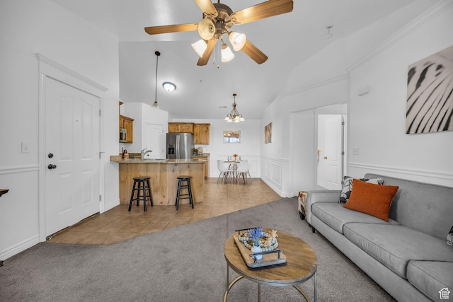 685 S 2220 W Unit 302, Pleasant Grove, UT 84062 - living area featuring light tile patterned flooring, light carpet, a ceiling fan, high vaulted ceiling, and a chandelier