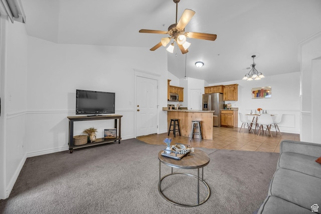 685 S 2220 W Unit 302, Pleasant Grove, UT 84062 - living room with a ceiling fan, a chandelier, high vaulted ceiling, light tile patterned flooring, and light carpet