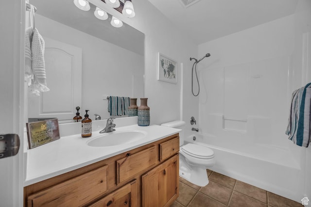 685 S 2220 W Unit 302, Pleasant Grove, UT 84062 - full bathroom featuring vanity, tile patterned flooring, washtub / shower combination, and toilet