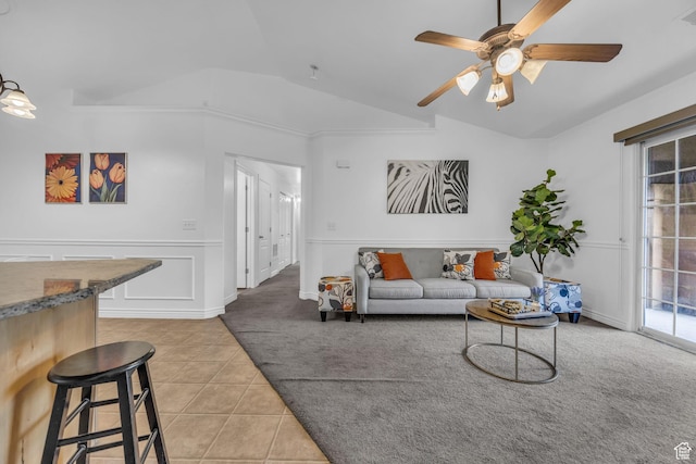 685 S 2220 W Unit 302, Pleasant Grove, UT 84062 - living area featuring light carpet, lofted ceiling, healthy amount of natural light, a ceiling fan, and light tile patterned floors