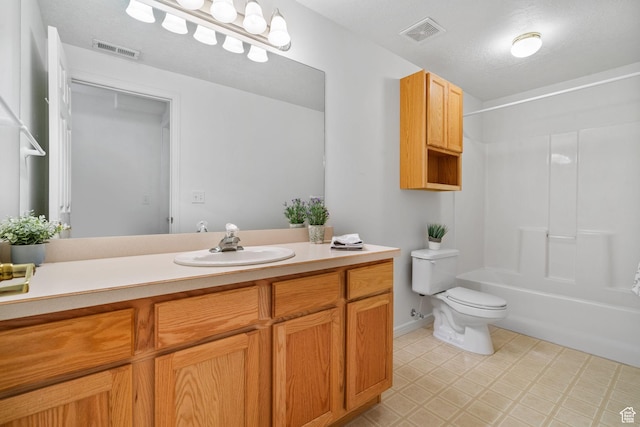 12482 S Tithing Point Dr, Riverton, UT 84065 - full bathroom with vanity, toilet, tile patterned floors, bathtub / shower combination, and baseboards