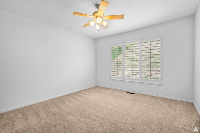 12482 S Tithing Point Dr, Riverton, UT 84065 - carpeted spare room featuring a ceiling fan and baseboards