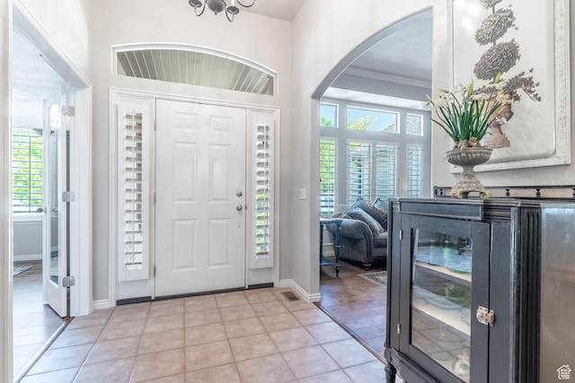 250 E 950 N, Kaysville, UT 84037 - foyer entrance featuring arched walkways, ornamental molding, and baseboards