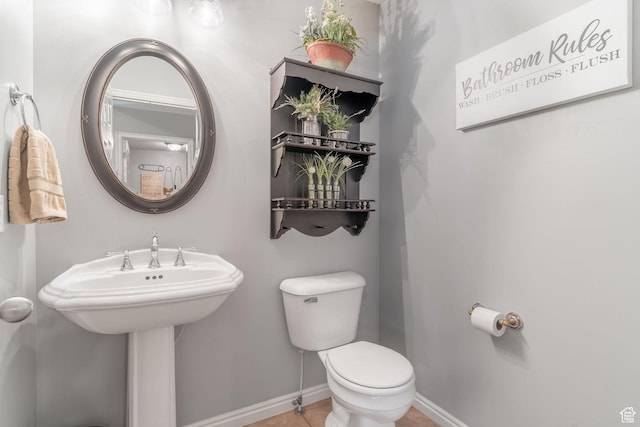 250 E 950 N, Kaysville, UT 84037 - half bath featuring toilet, baseboards, and tile patterned floors