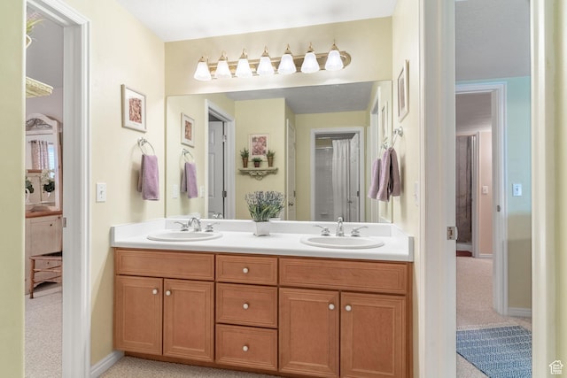 250 E 950 N, Kaysville, UT 84037 - bathroom with double vanity, baseboards, and ensuite bath